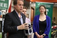 Sean Maw, principal investigator at the University of Saskatchewan College of Engineering, shows a 3D model of the RADSAT-SK cube satellite developed by students, including Rylee Moody, middle and Arliss Sidlowski, right. THE CANADIAN PRESS/Kelly Geraldine Malone