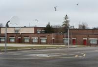 Basketball nets have been removed at the closed Tomken Road Middle School in Mississauga, Ont., on Tuesday, March 31, 2020. Ontario schools will remain closed until at least May due to the coronavirus also known as COVID-19. THE CANADIAN PRESS/Nathan Denette