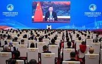 This photo taken on November 4, 2020 shows Chinese President Xi Jinping delivering a speech via video for the opening ceremony of the 3rd China International Import Expo (CIIE) in Shanghai. (Photo by STR / AFP) / China OUT (Photo by STR/AFP via Getty Images)
