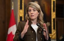 Foreign Affairs Minister Melanie Joly  speaks with reporters in the Foyer of the House of Commons about the situation in Sudan, Thursday, April 27, 2023 in Ottawa.  THE CANADIAN PRESS/Adrian Wyld