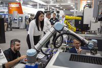People attend the 2019 Canadian Manufacturing Technology Show in a handout photo. Artificial intelligence and increased automation can help lessen the load for workers at a time when Canada faces a labour shortage in the construction and manufacturing sector. THE CANADIAN PRESS/HO-Canadian Manufacturing Technology Show-Marcus Oleniuk **MANDATORY CREDIT** 