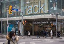 Shoppers and pedestrians are photographed outside Nordstrom Rack in Toronto, Ont., on Friday, March 3,
