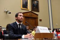 JUUL Labs co-founder and Chief Product Officer James Monsees testifies before a House Oversight and Government Reform subcommittee on Capitol Hill in Washington, Thursday, July 25, 2019, during a hearing on the youth nicotine epidemic. (AP Photo/Susan Walsh)