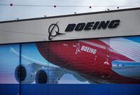 FILE PHOTO: A Boeing logo is seen at the company's facility in Everett after it was announced that their 777X model will make its first test flight later in the week in Everett, Washington, U.S. January 21, 2020.  REUTERS/Lindsey Wasson/File Photo