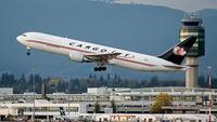 A Cargojet Boeing 767-328ER BDSF (C-FMIJ) air cargo freighter takes off from Vancouver International Airport, Richmond, B.C. on Friday, May 3, 2019.
