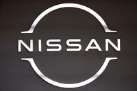 (FILES) This file photo taken on November 9, 2021 a Nissan logo at the company's headquarters in Yokohama. - Japanese carmaker Nissan will permanently cease production at its Barcelona plants, which will close on December 31, as discussions continue on the future of the facility and the 3,000 employees. (Photo by Behrouz MEHRI / AFP) (Photo by BEHROUZ MEHRI/AFP via Getty Images)