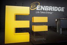 Enbridge company logos on display at the company's annual meeting in Calgary, Thursday, May 12, 2016.&nbsp; THE CANADIAN PRESS/Jeff McIntosh