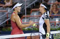 Canada's Bianca Andreescu congratulates her opponent Ons Jabeur, of Tunisia, following her victory during round of sixteen play at the National Bank Open tennis tournament Thursday August 12, 2021 in Montreal. THE CANADIAN PRESS/Paul Chiasson