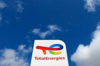 FILE PHOTO: The logo of French oil and gas company TotalEnergies is seen at a petrol station in Ressons, France, August 6, 2021. REUTERS/Pascal Rossignol/File Photo