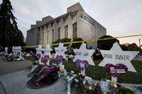 FILE - A makeshift memorial stands outside the Tree of Life Synagogue in the aftermath of a deadly shooting in Pittsburgh, Oct. 29, 2018. Robert Bowers, the man who killed 11 congregants at the Pittsburgh synagogue, was formally sentenced to death on Thursday, Aug. 3, 2023, one day after a jury determined that capital punishment was appropriate for the perpetrator of the deadliest attack on Jews in U.S. history. (AP Photo/Matt Rourke, File)
