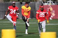 TEMPE, ARIZONA - FEBRUARY 08: Melvin Gordon III #34, Patrick Mahomes #15 and Clyde Edwards-Helaire #25 of the Kansas City Chiefs participate in practice prior to Super Bowl LVII at Arizona State University on February 08, 2023 in Tempe, Arizona. The Kansas City Chiefs play the Philadelphia Eagles in Super Bowl LVII on February 12, 2023 at State Farm Stadium. (Photo by Christian Petersen/Getty Images)