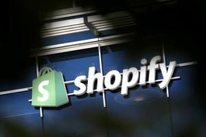 FILE PHOTO: The logo of Shopify is seen outside its headquarters in Ottawa, Ontario, Canada, September 28, 2018. REUTERS/Chris Wattie/File Photo
