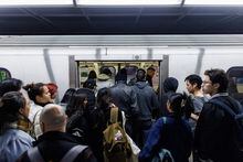 People enter a subway train inside a Toronto Transit Commission station in downtown Toronto, Saturday, April 1, 2023. THE CANADIAN PRESS/Cole Burston