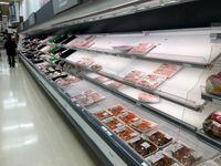 Grocery store shelves await restocking early in the morning in Toronto on Friday March 13, 2020. THE CANADIAN PRESS/Frank Gunn