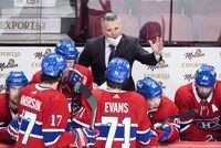 Montreal Canadiens interim head coach Martin St. Louis talks with players during first period NHL hockey action the Buffalo Sabres in Montreal, Sunday, February, 13, 2022. THE CANADIAN PRESS/Graham Hughes