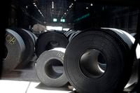 FILE - In this June 28, 2018, file photo, rolls of finished steel are seen at the U.S. Steel Granite City Works facility in Granite City, Ill. Companies seeking relief from President Donald Trump’s taxes on imported steel and aluminum ran into long delays and cumbersome paperwork, a federal watchdog found, Wednesday, Sept. 16, 2020. The U.S. Government Accountability Office reported that the Commerce Department, overwhelmed by companies lobbying to avoid the tariffs, could not meet its own deadline for processing around three-fourths of the requests. (AP Photo/Jeff Roberson, File)