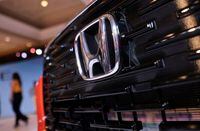 FILE PHOTO: Honda's logo is seen on the front grill of the new SUV Elevate, during its world premiere, at an event in New Delhi, India, June 6, 2023. REUTERS/Anushree Fadnavis/File Photo