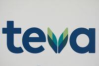 FILE PHOTO: The logo of Teva Pharmaceutical Industries is seen during a news conference hold by its CEO, Kare Schultz, to discuss the company's 2019 outlooks in Tel Aviv, Israel February 19, 2019. REUTERS/Amir Cohen/File Photo