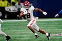 Alabama wide receiver John Metchie III (8) runs against Florida during the first half of the Southeastern Conference championship NCAA college football game, Saturday, Dec. 19, 2020, in Atlanta. (AP Photo/John Bazemore)