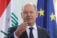 German Chancellor Olaf Scholz gestures at a news conference with the Iraqi prime minister at the Federal Chancellery in Berlin, Germany January 13, 2023. REUTERS/Michele Tantussi