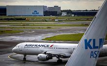 (FILES) In this file photo taken on May 24, 2022 an Air France plane is pictured on the tarmac of the Schiphol airport as Air France-KLM announced a bid to raise 2,26 billion euros ($2,4 bn) by issuing new shares, as the debt-laden company seeks to put the coronavirus crisis that has ravaged its finances behind it. - European airline group Air France-KLM said October 28, 2022 that its third quarter revenues had exceeded its pre-pandemic turnover in 2019, fuelled by strong post-Covid demand for travel. The company recorded a net profit of 460 million euros ($459 million) between July and September in a second consecutive quarter of profitability, despite the pressures of soaring inflation and fuel costs, it said in a statement. (Photo by Ramon van Flymen / ANP / AFP) / Netherlands OUT (Photo by RAMON VAN FLYMEN/ANP/AFP via Getty Images)