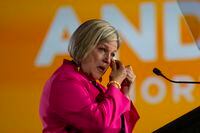 Ontario NDP Leader and Member of Provincial Parliament for Hamilton Centre Andrea Horwath wipes a tear as she announces her resignation as party leader during her campaign event in Hamilton, Ont., Thursday, June 2, 2022. THE CANADIAN PRESS/Tara Walton