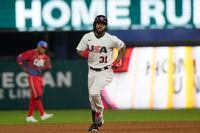 U.S. 's Cedric Mullins (31) runs the bases after hitting a solo home run during the eighth inning of a World Baseball Classic game against Cuba, Sunday, March 19, 2023, in Miami. The U.S. defeated Cuba 14-2. (AP Photo/Marta Lavandier)