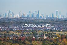 The condos and office towers in the city of Mississauga are seen in the distance with the town of Milton, Ont. in the foreground, as photographed from Steeles Ave. West, near the Niagara Escarpment. Oct 15 2019