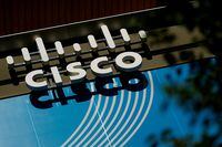 FILE PHOTO: The logo of U.S. networks giant Cisco Systems is seen in front of their headquarters in Issy-les-Moulineaux, near Paris, France August 6, 2022. REUTERS/Sarah Meyssonnier/File Photo