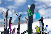 Pas de la Casa, Andorra, December 08 2019: Close-up on a ski rack at the terrace of a café boarding the ski slope of Grandvalira, the largest ski resort in the Pyrenees and southern Europe.