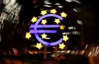 FILE PHOTO: The euro sign is photographed in front of the former head quarter of the European Central Bank in Frankfurt, Germany, April 9, 2019. Picture is taken on slow shutter speed while the camera was moved.  REUTERS/Kai Pfaffenbach/File Photo