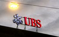 FILE PHOTO: The logo of Swiss bank UBS is seen at a branch office in Zurich, Switzerland June 22, 2020. REUTERS/Arnd Wiegmann/File Photo