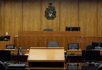 A Court of King's Bench courtroom is shown at the Edmonton Law Courts building on Friday, June 28, 2019. A former medical health officer in Alberta has been found guilty of sexual assault and sexual interference of a child. THE CANADIAN PRESS/Jason Franson