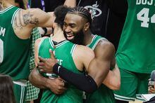 MIAMI, FLORIDA - MAY 27: Derrick White #9 and Jaylen Brown #7 of the Boston Celtics react after defeating the Miami Heat 104-103 in game six of the Eastern Conference Finals at Kaseya Center on May 27, 2023 in Miami, Florida. NOTE TO USER: User expressly acknowledges and agrees that, by downloading and or using this photograph, User is consenting to the terms and conditions of the Getty Images License Agreement. (Photo by Megan Briggs/Getty Images)