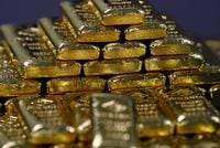 FILE PHOTO: Gold bars are seen in the Austrian Gold and Silver Separating Plant 'Oegussa' in Vienna, Austria, December 15, 2017.  REUTERS/Leonhard Foeger/File Photo