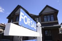 A new home is displayed for sale in a new housing development in Ottawa on Tuesday, July 14, 2020. The federal banking regulator is keeping the interest rate used in a key stress test for uninsured mortgages on hold. THE CANADIAN PRESS/Sean Kilpatrick