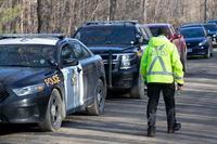 A member Ottawa Volunteer Search and Rescue stands near the area where three-year-old Jude Leyton went missing, near Verona, Ont., on March 29, 2021.