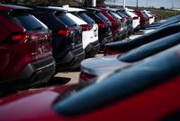 New Toyota RAV4 crossover SUVs for sale are seen at an auto mall in Ottawa, April 26, 2021. DesRosiers Automotive Consultants Inc. says Canadian auto production rose last year to break a five year streak of declining output. THE CANADIAN PRESS/Justin Tang