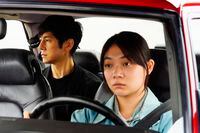 This image released by Janus Films and Sideshow shows Hidetoshi Nishijima, left, and Toko Miura in a scene from "Drive My Car." (Janus Films and Sideshow via AP)