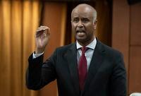 Housing and Diversity and Inclusion Minister Ahmed Hussen rises during Question Period, Thursday, June 2, 2022 in Ottawa.  THE CANADIAN PRESS/Adrian Wyld