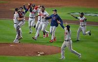Nov 2, 2021; Houston, Texas, USA; Atlanta Braves players celebrate on the field after defeating the Houston Astros during game six of the 2021 World Series at Minute Maid Park. Mandatory Credit: Jerome Miron-USA TODAY Sports