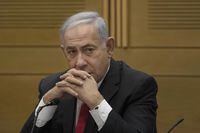 FILE - Former Israeli Prime Minister Benjamin Netanyahu speaks to right-wing opposition party members, at the Knesset, Israel's parliament, in Jerusalem, June 14, 2021. Netanyahu was hospitalized on Wednesday, Oct. 5, 2022, after feeling unwell during the Jewish fasting day of Yom Kippur. (AP Photo/Maya Alleruzzo, File)