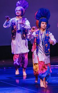 Nine-year-old Viaan Deol (right), shown in a handout photo, has been taking bhangra lessons since he was four. A small pilot project at four elementary schools in Surrey, B.C., where students took lessons in the Punjabi folk dance for seven months suggests it improved their aerobic fitness levels. THE CANADIAN PRESS/HO