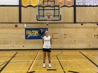 Mali Straker, the flag-bearer for Team Northwest Territories at the opening ceremonies for the 2022 Canada Summer Games in Niagara Region of Ontario from August 6 to 21, and a member on the N.W.T.'s women's basketball team, poses for a photo at Sir John Franklin High School in Yellowknife, N.W.T., on Tuesday, July 26, 2022. THE CANADIAN PRESS/Emily Blake