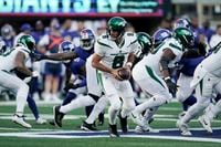 New York Jets quarterback Aaron Rodgers (8) during an NFL football game against the New York Giants, Saturday, Aug. 26, 2023 in East Rutherford, N.J. (AP Photo/Vera Nieuwenhuis)
