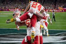 Kansas City Chiefs wide receiver Skyy Moore (24) celebrates his touchdown with teammates during the second half of the NFL Super Bowl 57 football game against the Philadelphia Eagles, Sunday, Feb. 12, 2023, in Glendale, Ariz. (AP Photo/Seth Wenig)