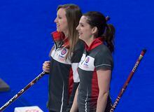 Ontario skip Rachel Homan, left, and lead Lisa Weagle share a light moment as they play Nova Scotia at the Scotties Tournament of Hearts at Centre 200 in Sydney, N.S. on Sunday, Feb. 17, 2019. THE CANADIAN PRESS/Andrew Vaughan