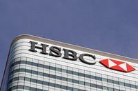 FILE PHOTO: The HSBC bank logo is seen in the Canary Wharf financial district in London, Britain, March 3, 2016.  REUTERS/Reinhard Krause