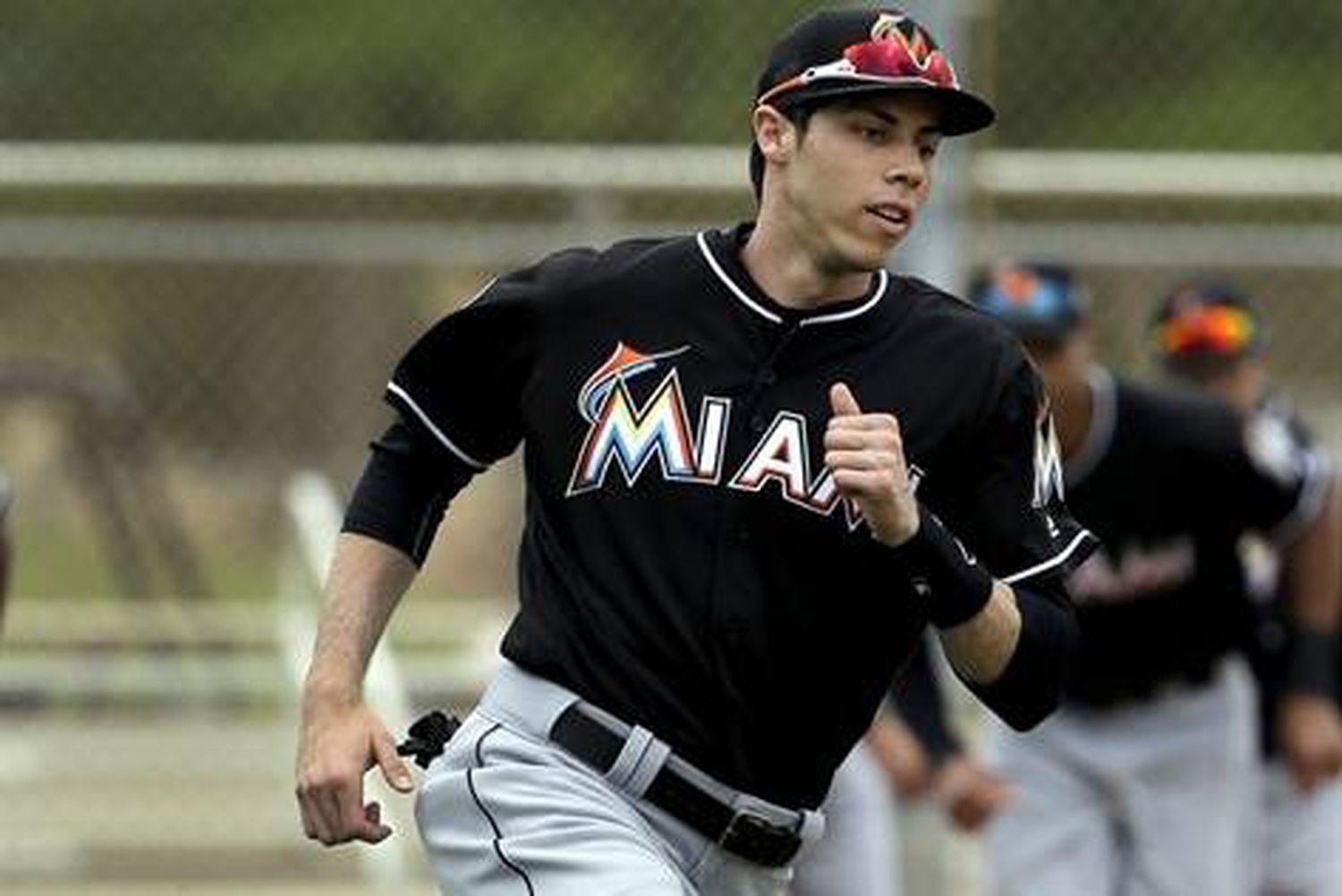 Brewers trade four prospects for Marlins' Christian Yelich in