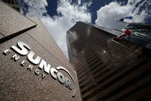 FILE PHOTO: The Suncor Energy logo is seen at their head office in Calgary, Alberta, Canada, April 17, 2019. REUTERS/Chris Wattie/File Photo